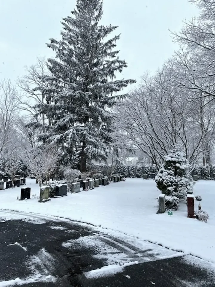 Commack Cemetery Grounds on Long Island, NY covered in snow