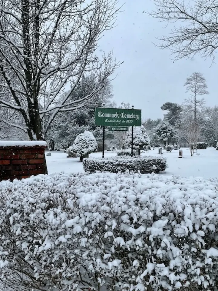 Commack Cemetery Entrance on Long Island, NY covered in snow